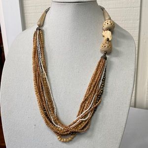 Unique long multi strand carved bead elephant necklace